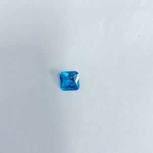 Genuine Blue topaz caution cut with beautiful spark, approx size just under 1/2”
